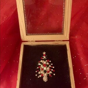 Framed Christmas tree art in a small shadow box.